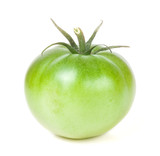 one green unripe tomato isolated on white background