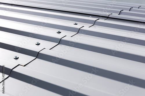 gray corrugated metal cladding on industrial building roof