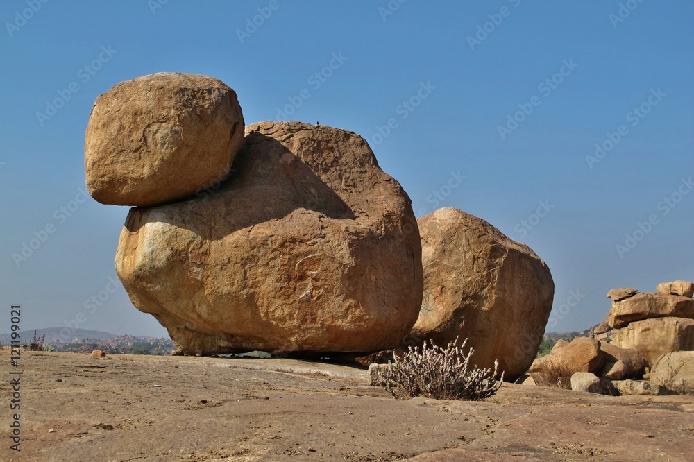 Big granite boulder popular for rock climbing Big granite boulder popular for rock climbing