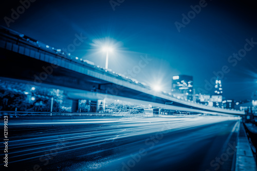 blurred traffic light trails on road in Beijing,China.