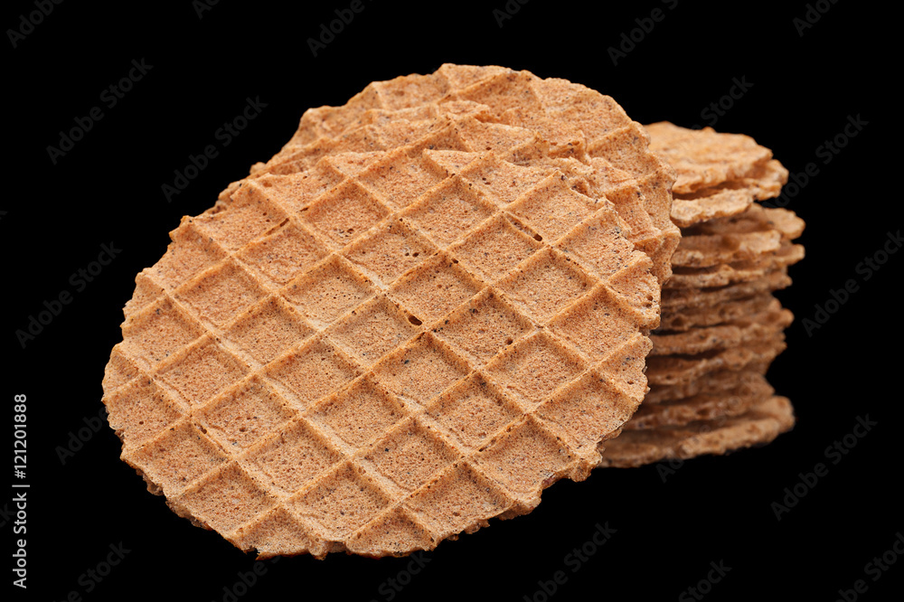 Round salted wafer on black Round salted wafer on black