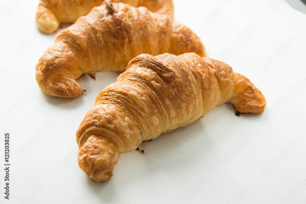  Croissant isolated on white background closeup