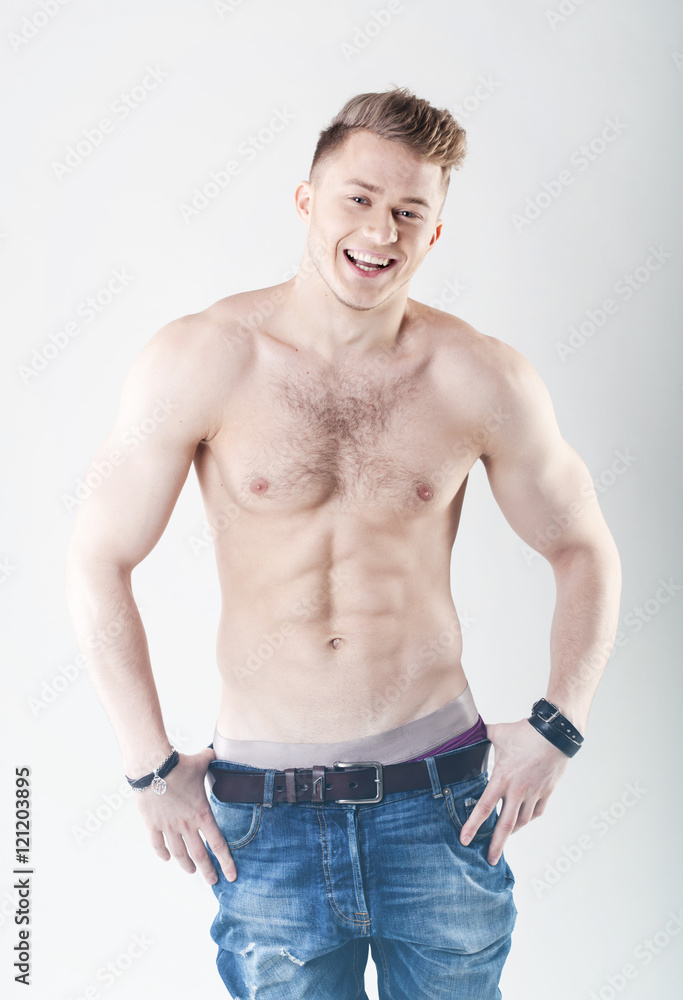 Attractive shirtless muscular guy.
Attractive shirtless muscular guy.