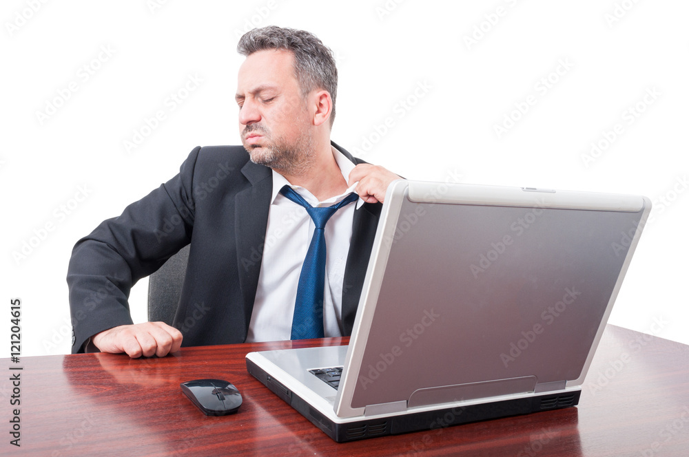 Man at office being hot or sick pulling tie Man at office being hot or sick pulling tie