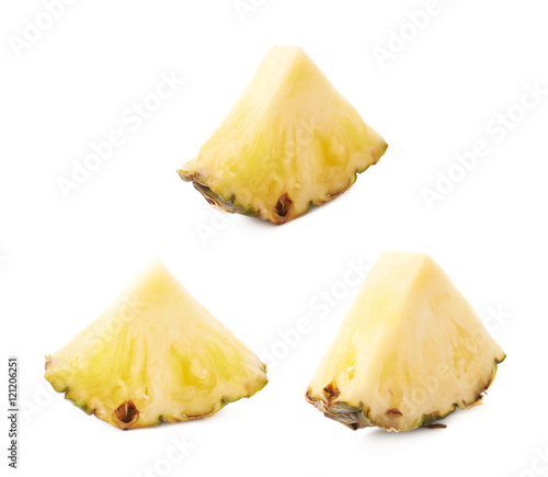 Slice of pineapple isolated over white background