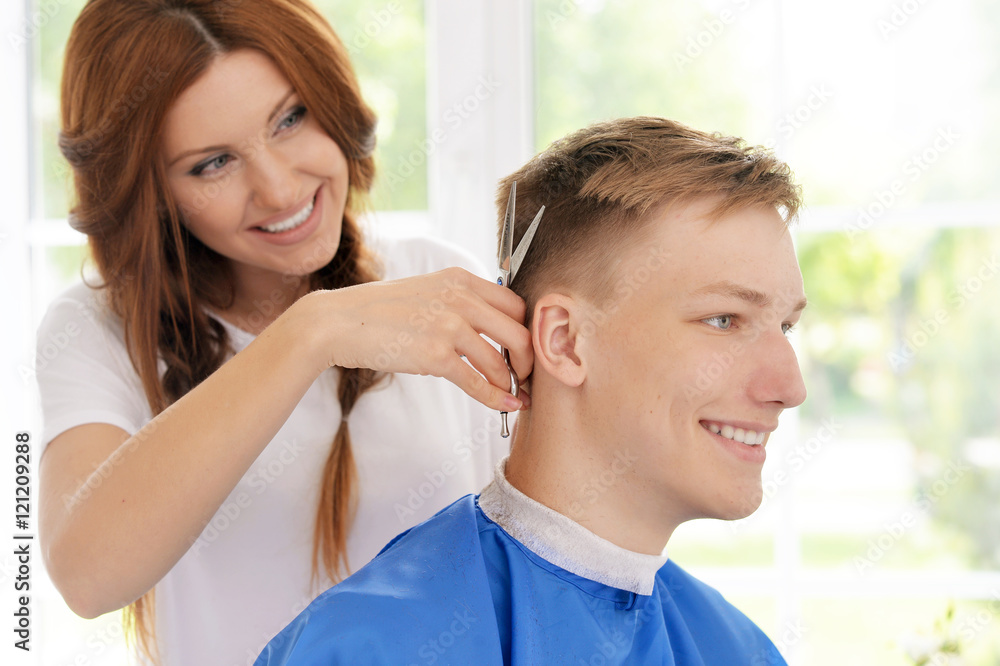 Fototapeta premium boy getting haircut 