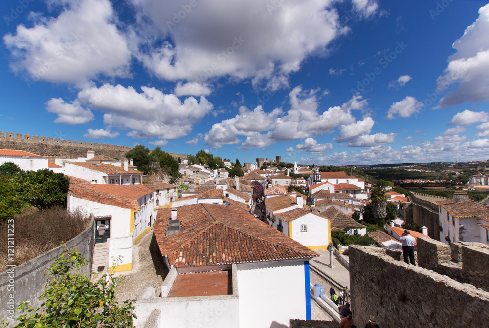 Over the roofs of the old town of Obidos, a medieval town in Portugal