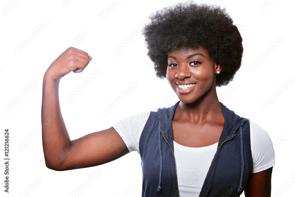 Sporty african girl showing her biceps