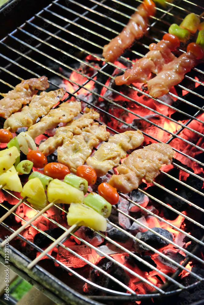 Grilled skewer on fire