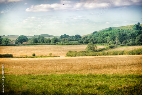Harvested fields and distant hills
