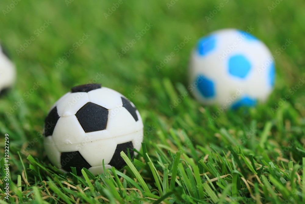 Fototapeta premium Soccer ball on field