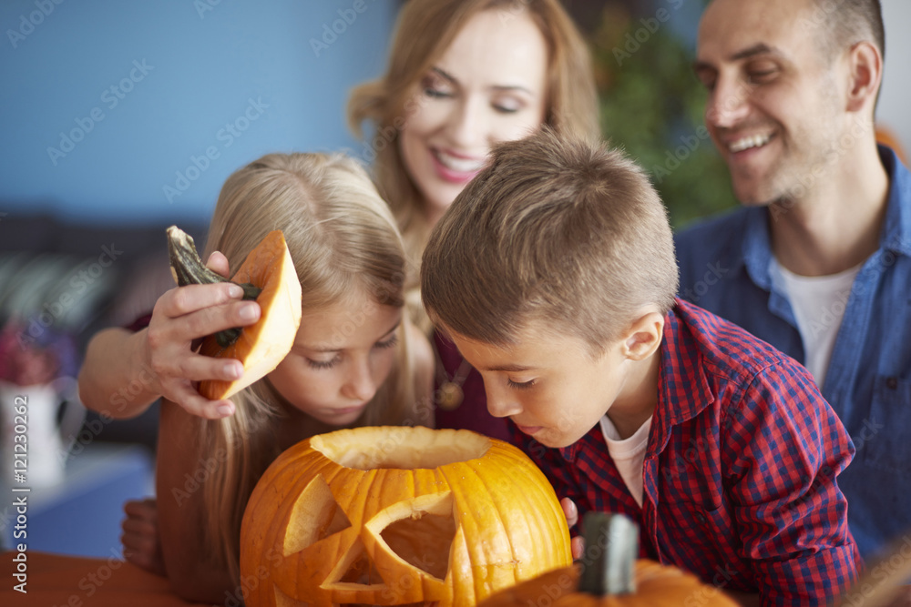 Drilled pumpking and curious children Drilled pumpking and curious children