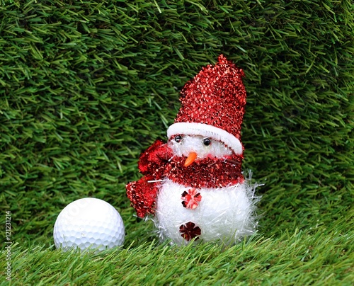 golf ball on green course background idea for Christmas theme