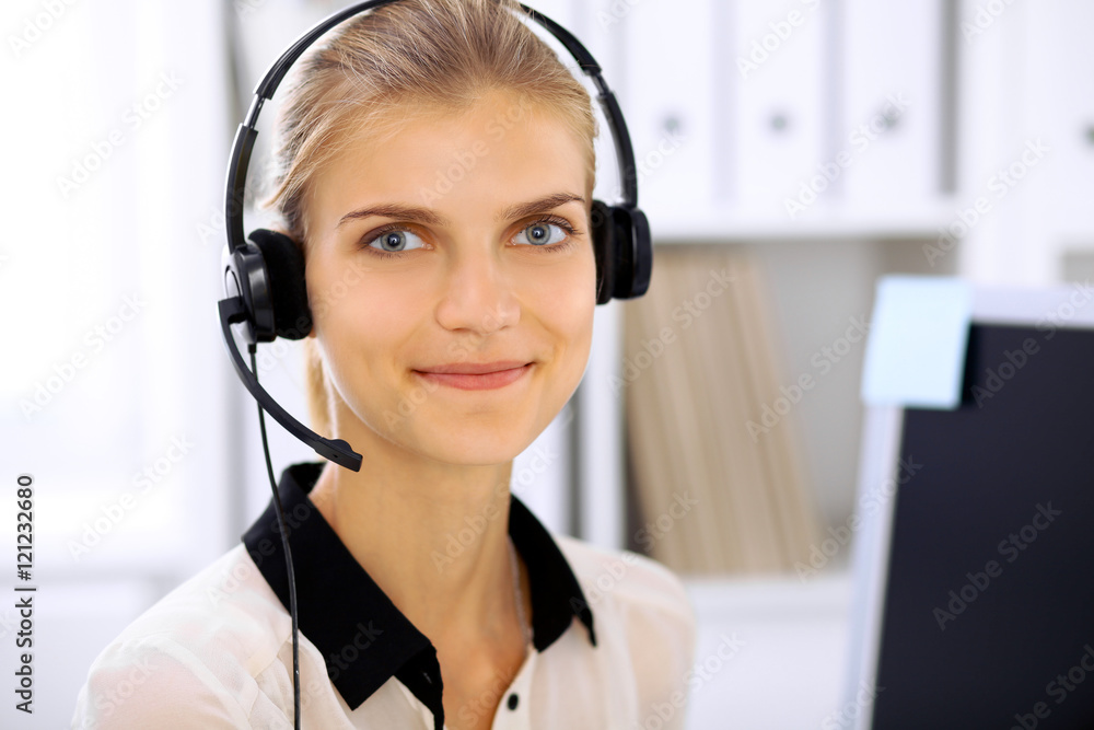 Modern business woman in headset the office Modern business woman in headset the office