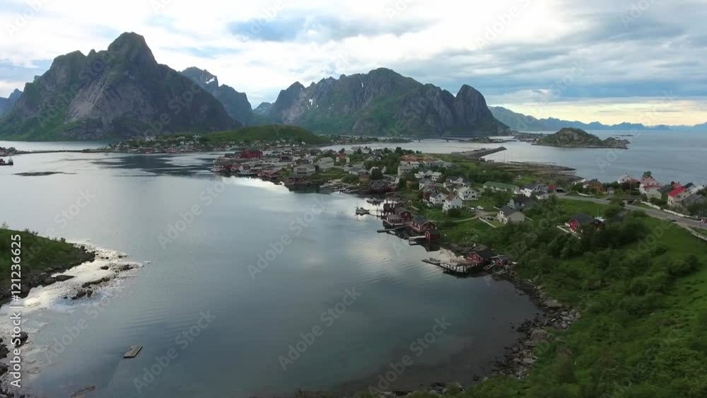 Lofoten islands is an archipelago in the county of Nordland, Norway. Is known for a distinctive scenery with dramatic mountains and peaks, open sea and sheltered bays, beaches and untouched lands.