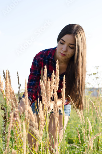 girl walking in field © vladimirvu