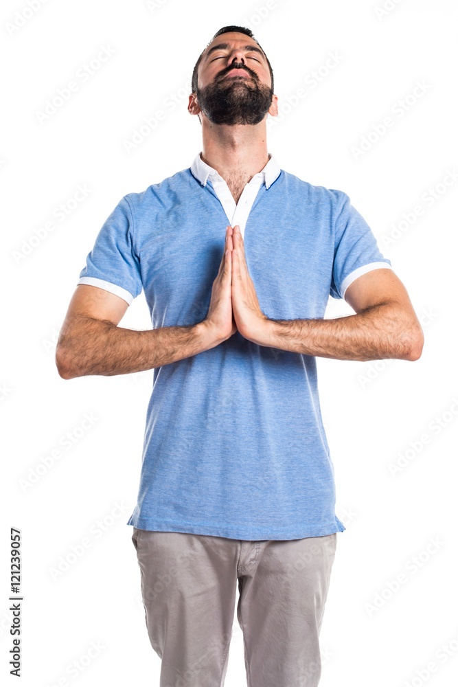 Fototapeta premium Man with blue shirt in zen position