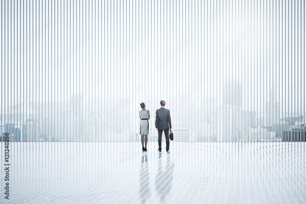 Businesspeople standing in abstract interior