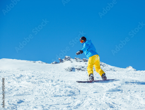 Snowboarder at the winter resort