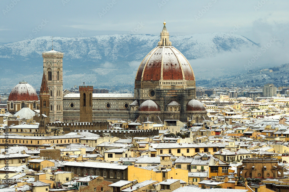 cathedral Santa Maria del Fiore (Duomo) and giottos bell tower (campanile), in winter with snow Florence, Tuscany, Italy