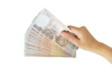 Hand holding money isolated on white background with clipping paths.