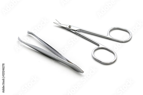 scisor and tweezers isolated on white background