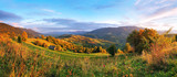 September rural scene in mountains. Autumn hill panorama