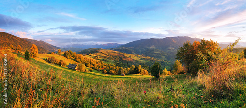 September rural scene in mountains. Autumn hill panorama