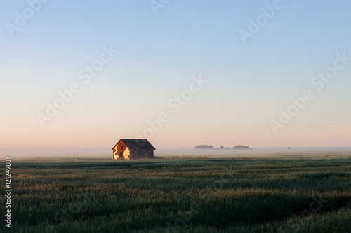 Barn in Morning Fog on Prairie