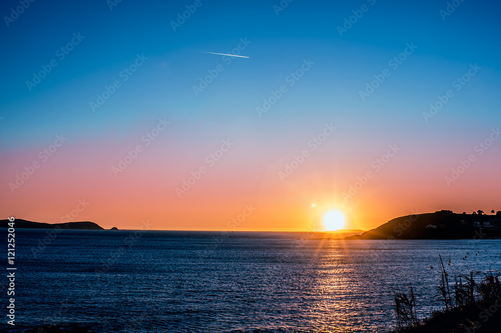 Naklejka premium Atardecer en la costa, Galicia, España