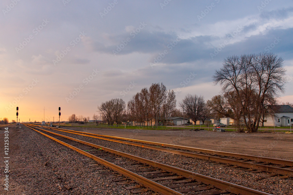 Golden Prairie Sunrise with Railroad Tracks