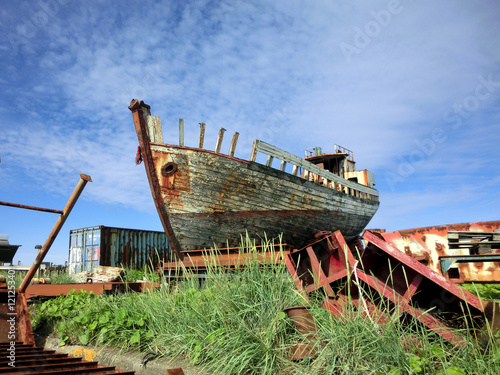 Large boat abandoned in Icelandic shipyard