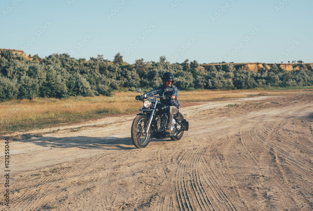 man riding motorcycle