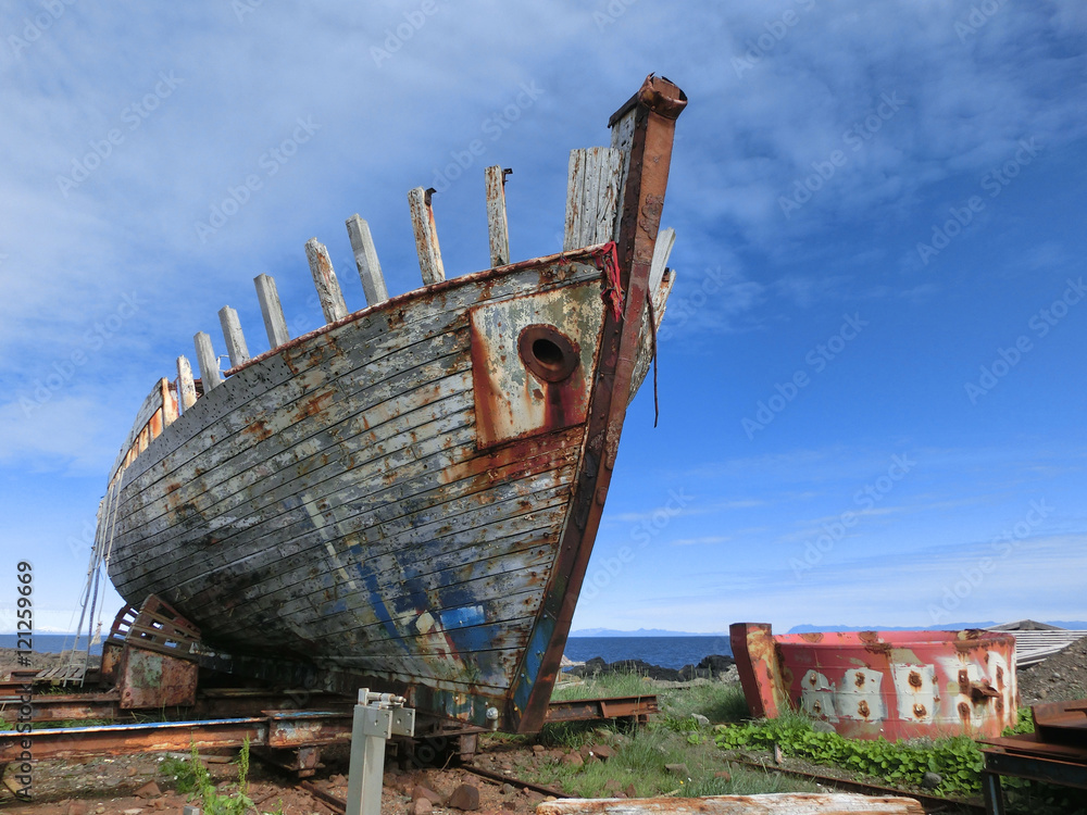 Large boat abandoned in Icelandic shipyard