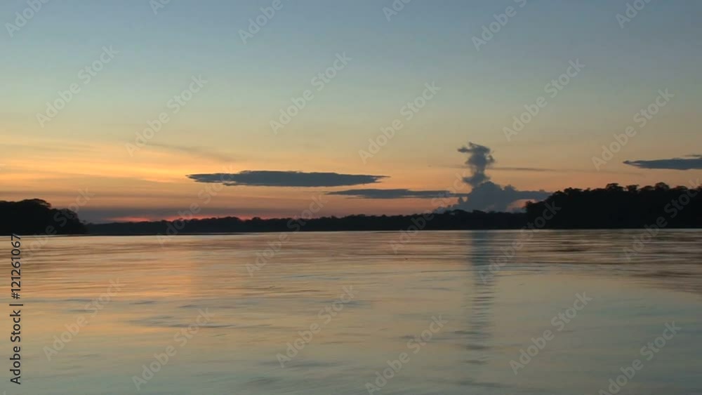 Sunset from boat in the amazone rainforest Sunset from boat in the amazone rainforest