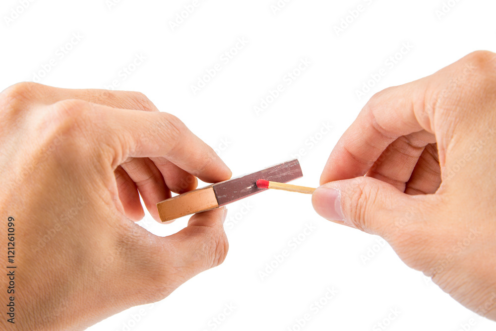 hands striking a match hands striking a match