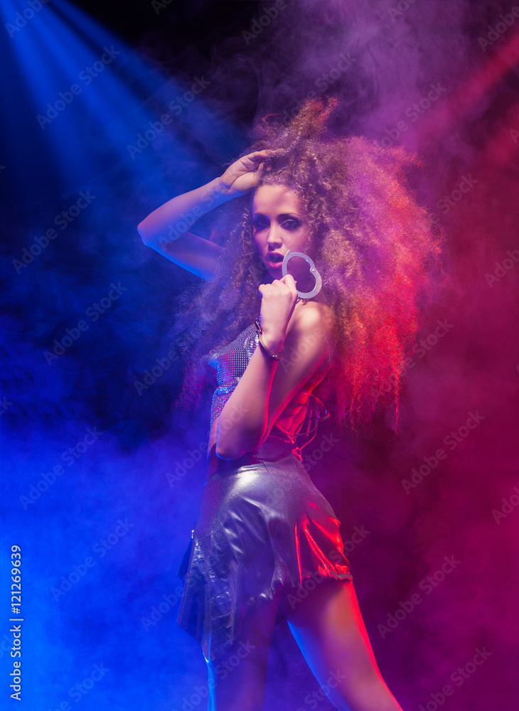 Sexy woman is dancing disco