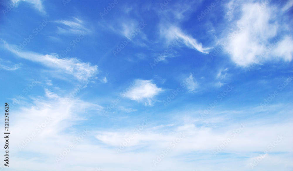 Blue sky background with tiny clouds - obrazy, fototapety, plakaty 