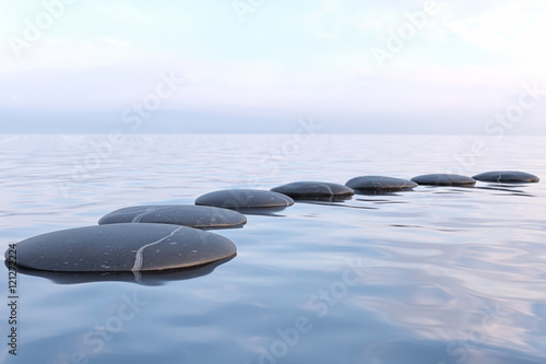 Zen stones in water  photo