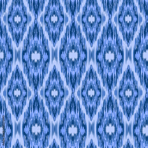 Seamless pattern Tribal Art Ikat Ogee in traditional classic blue and white colors. Boho style.