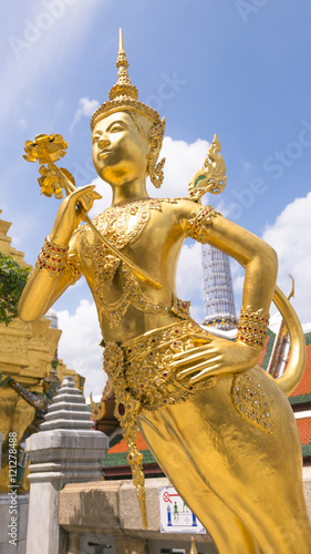 Golden angel statue of the Emerald Buddha temple Wat phra kaew  and Royal Grand Palace  Bangkok Thailand.