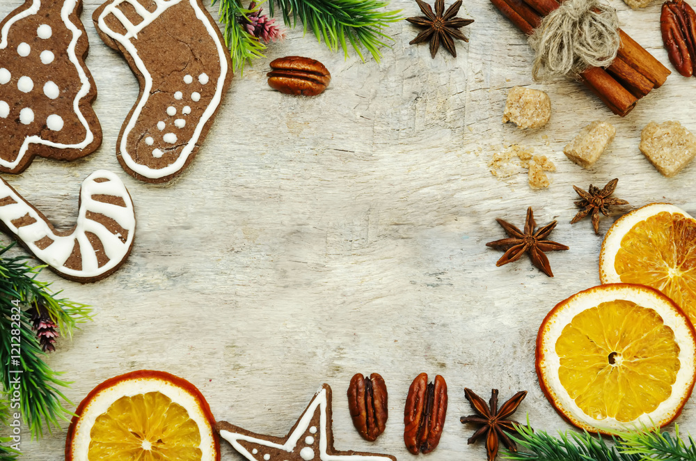 wood background with Christmas tree, candy, cookies, and snowfla wood background with Christmas tree, candy, cookies, and snowfla