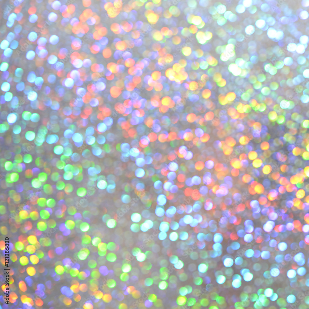 Unfocused abstract colorful glitter holiday background. Winter xmas holidays.