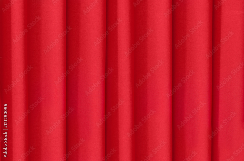 The background is draped in bright red cloth The background is draped in bright red cloth