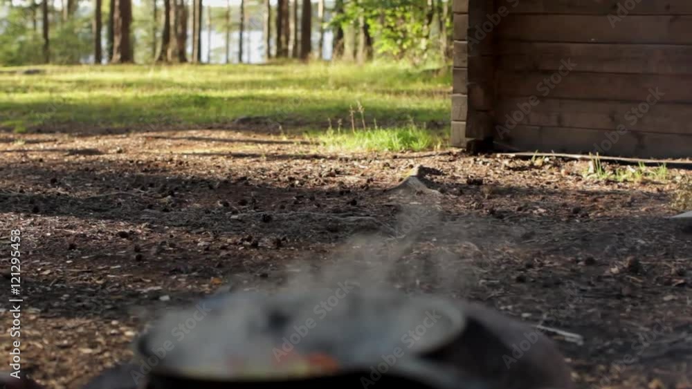 Vegetarian Stew Prepared on a Large Frying Pan Over a Fire Vegetarian Stew Prepared on a Large Frying Pan Over a Fire