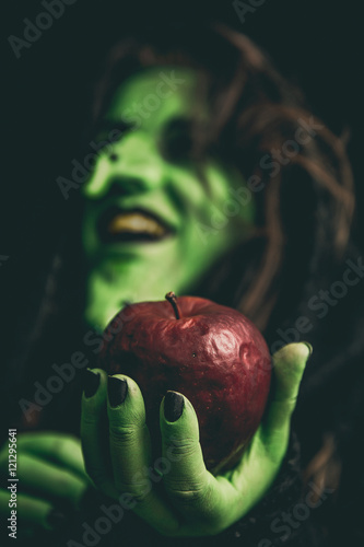 Wallpaper Mural Rotten apple on a witch hand Torontodigital.ca