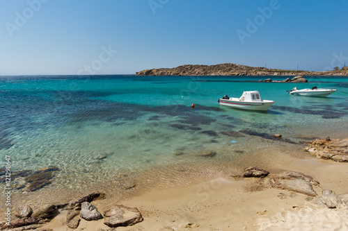 Clean Waters of Paranga Beach on the island of Mykonos, Cyclades, Greece