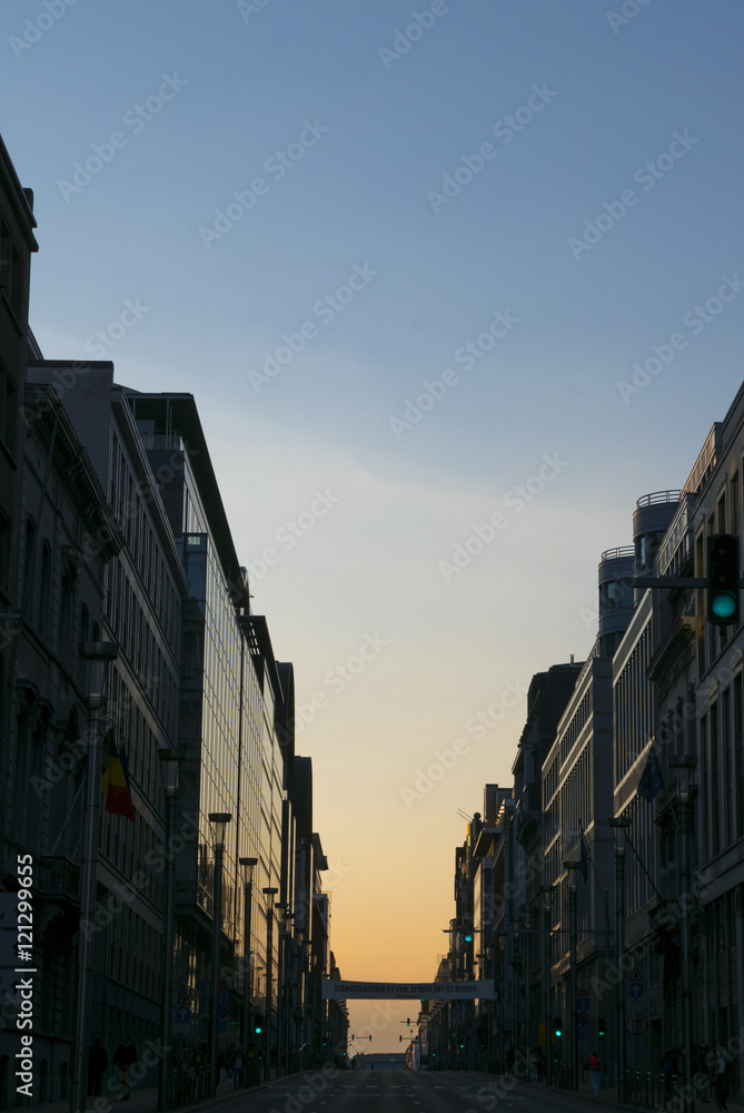 Rue de la Loi in Brussels with no car and no people with sunset,