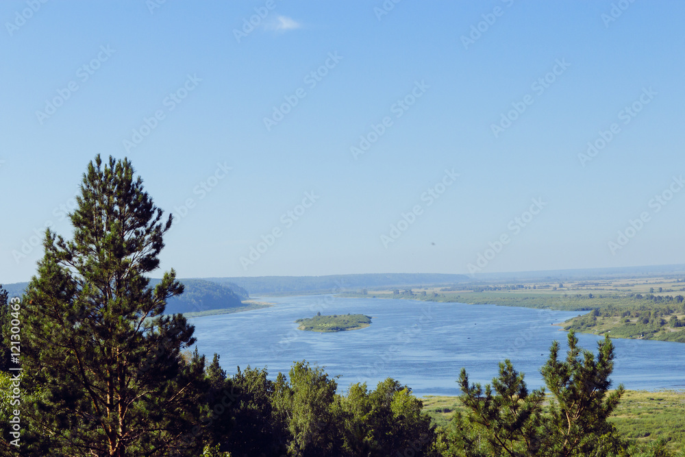 Aerial view the river on green forest plain..