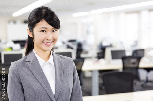 asian businesswoman standing in the office